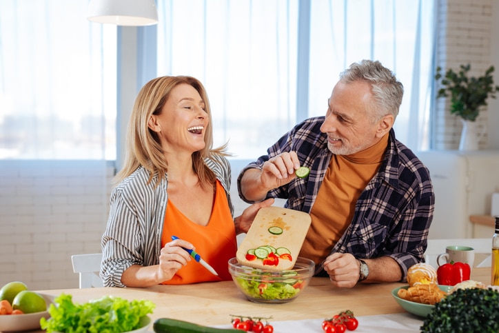 Happy Couple Cooking Healthy in Kitchen