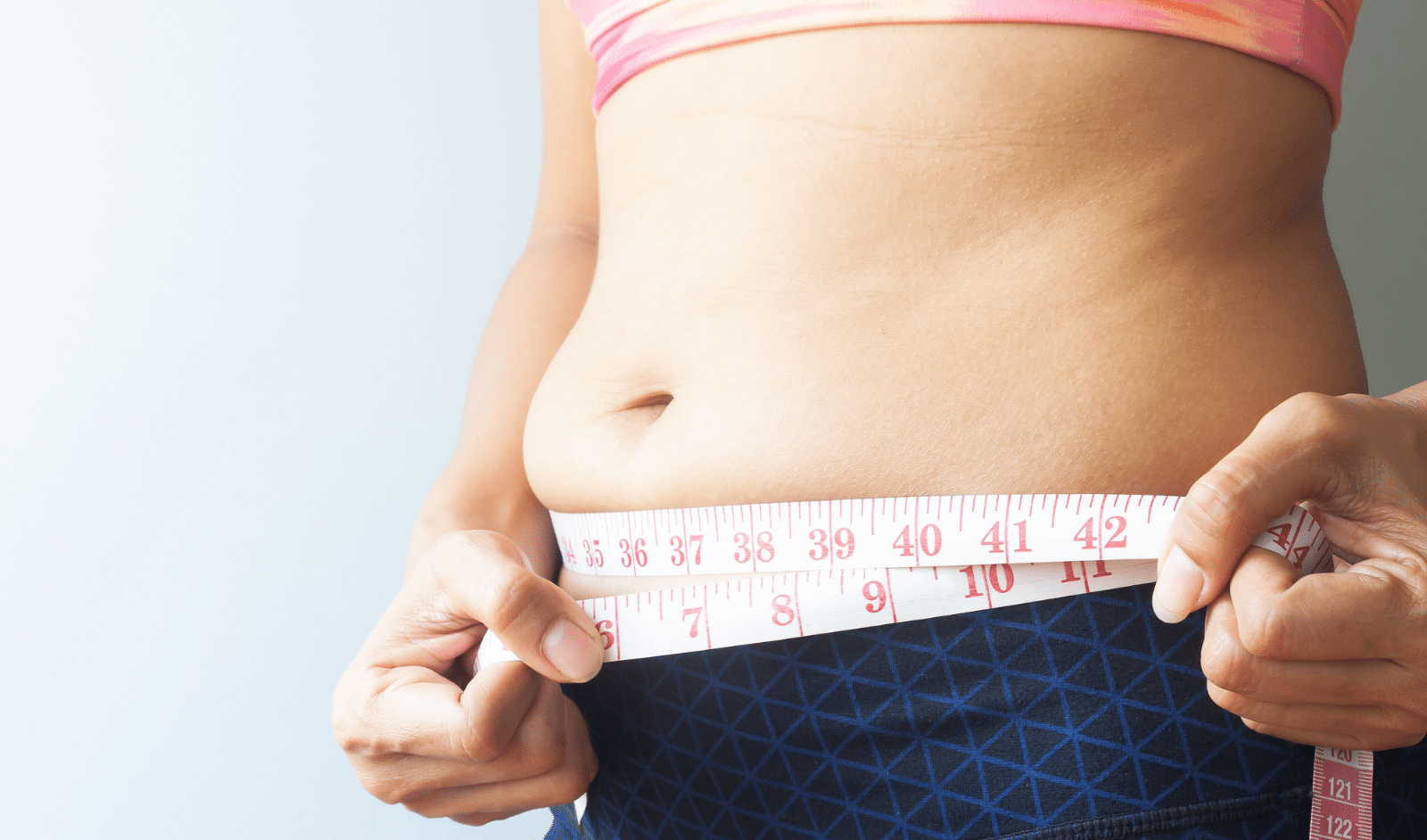 Weight loss, stomach and measure tape for body measurement for