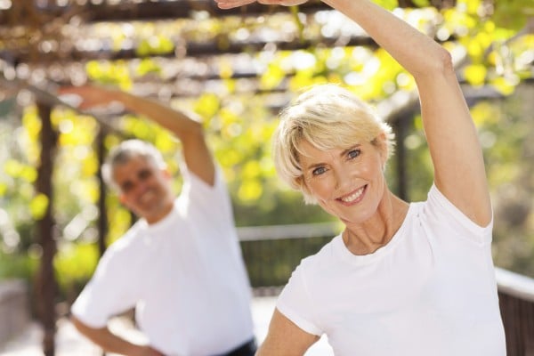 Woman and man exercising