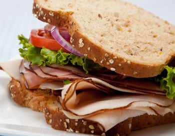 Lose weight while still enjoying favorites like this healthy turkey sandwich.